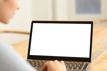 Blank laptop screen being used by woman