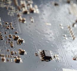 Electronic circuit board close up. Integrated chip on the pcb. Digital background.