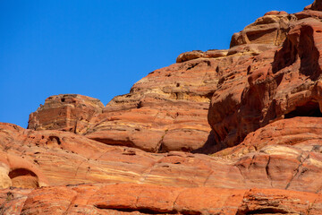 Fototapeta premium Facades Street caves in the ancient city of Petra City, Jordan Petra, famous historical and archaeological site