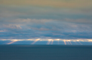 Sunrise with beams of light over the Atlantic
