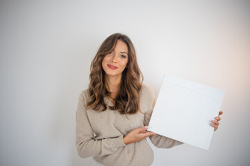 Naklejka premium Artist holding a Canvas