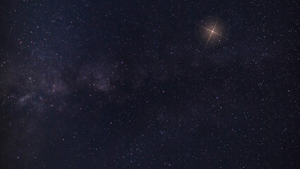 Christmas star rising near the Milky Way