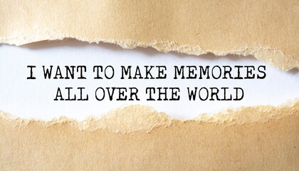 I Want to Make Memories All Over the World word written under torn paper.