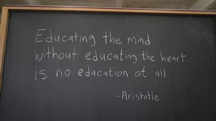 Chalkboard quote about education from Aristotle on educating the heart