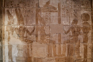 Inscription with  Seti I on a throne greeted by gods, from the mortuary temple of Seti I in Thebes - West Bank of Luxor