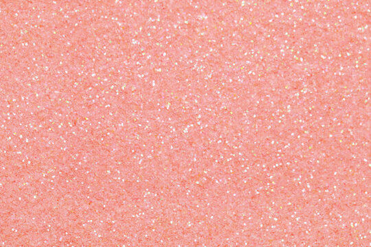 Beautiful pink shiny glitter as background, top view
