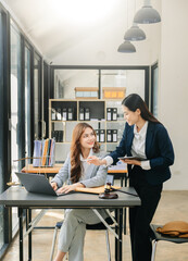 Business law concept, Lawyer business lawyers are consulting lawyers for women entrepreneurs to file copyright lawsuit with laptop and tablet