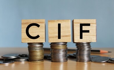 Cost, insurance, and freight (CIF) concept, CIF concept on wooden blocks. 