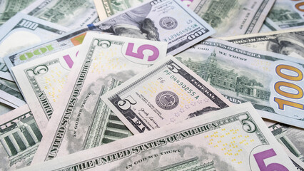 Background from different banknotes of dollars and euros. Concept of economic crisis and save money