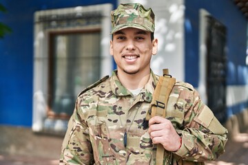 Young man army soldier smiling confident standing at street