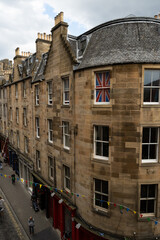 the union jack flag of the united kingdom on display in the window of a house in Victoria Street...