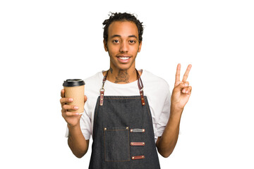 Young African American waiter man holding a takeaway coffee isolated joyful and carefree showing a...
