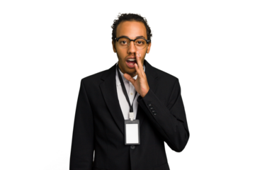 Young African American business man with badge isolated is saying a secret hot braking news and looking aside