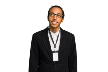 Young African American business man with badge isolated dreaming of achieving goals and purposes