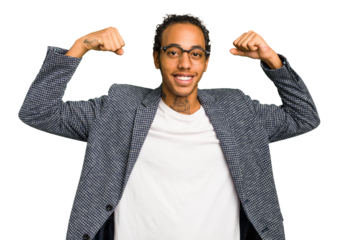 Young African American man isolated showing strength gesture with arms, symbol of feminine power