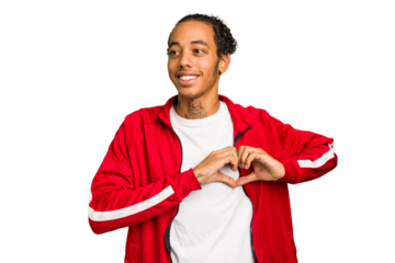 Young African American man isolated smiling and showing a heart shape with hands.