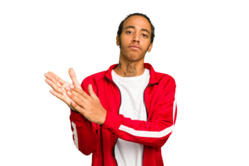 Young African American man isolated feeling energetic and comfortable, rubbing hands confident.
