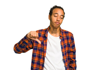 Young African American man isolated showing a dislike gesture, thumbs down. Disagreement concept.