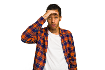 Young African American man isolated looking far away keeping hand on forehead.