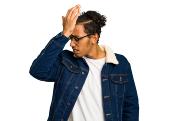 Young African American man isolated forgetting something, slapping forehead with palm and closing eyes.