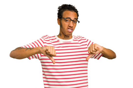 Young African American man isolated showing thumb down, disappointment concept.