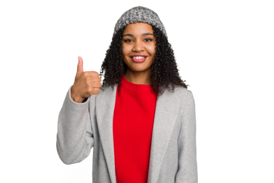 Young african american woman wearing winter jacket isolated smiling and raising thumb up