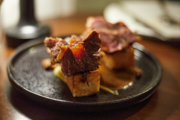 Braise beef cheek,Beef jus,Caramelize onion, selective focus,