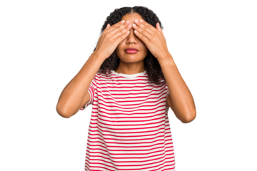 Young african american woman with curly hair cut out isolated afraid covering eyes with hands.