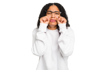 Young african american woman with curly hair cut out isolated whining and crying disconsolately.