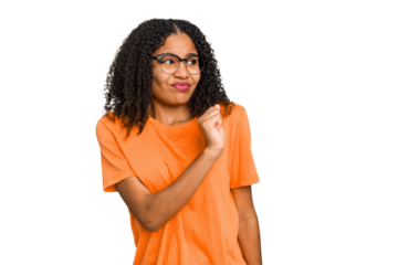 Young african american woman with curly hair cut out isolated confused, feels doubtful and unsure.