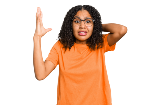 Young african american woman with curly hair cut out isolated screaming with rage.