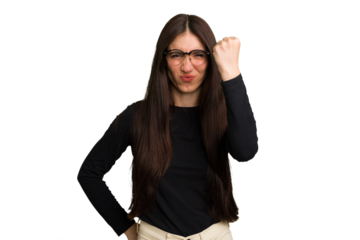 Young caucasian brunette long hair woman cutout isolated showing fist to camera, aggressive facial expression.