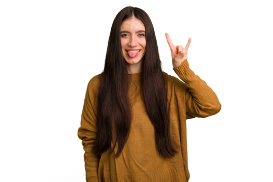 Young caucasian brunette long hair woman cutout isolated showing a horns gesture as a revolution concept.