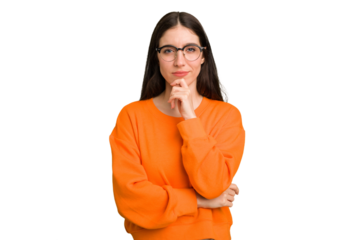 Young caucasian brunette long hair woman cutout isolated thinking and looking up, being reflective, contemplating, having a fantasy.