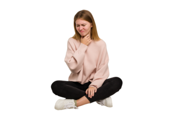 Young caucasian woman sitting on the floor cutout isolated