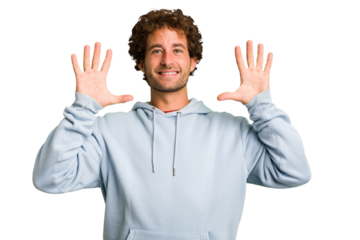 Young curly smart caucasian man cut out isolated showing number ten with hands.