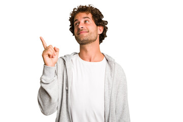 Young curly smart caucasian man cut out isolated showing number one with finger.