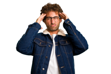 Young curly smart caucasian man cut out isolated touching temples and having headache.