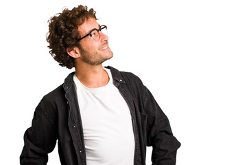 Young curly smart caucasian man cut out isolated relaxed and happy laughing, neck stretched showing...