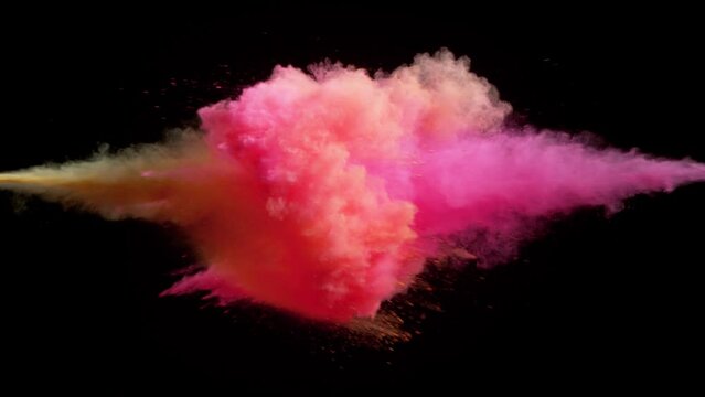 Super slow motion of colored powder collision isolated on black background. Filmed on high speed cinema camera, 1000fps.