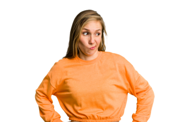 Young caucasian woman cutout isolated confused, feels doubtful and unsure.