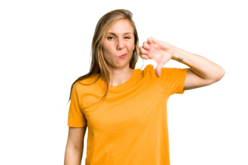 Young caucasian woman cutout isolated showing thumb down, disappointment concept.