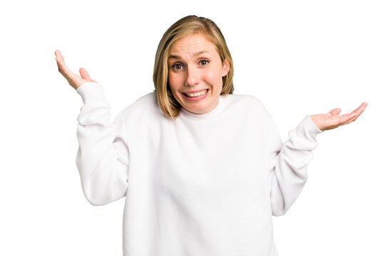 Young caucasian woman cutout isolated confused and doubtful shrugging shoulders to hold a copy space.