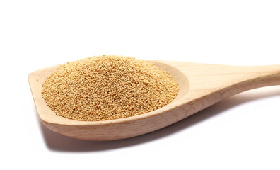 Amaranth seeds with wooden spoon isolated on white  