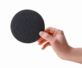 Sandpaper sanding disc isolated on white background. A round disc of sandpaper for a grinder with...