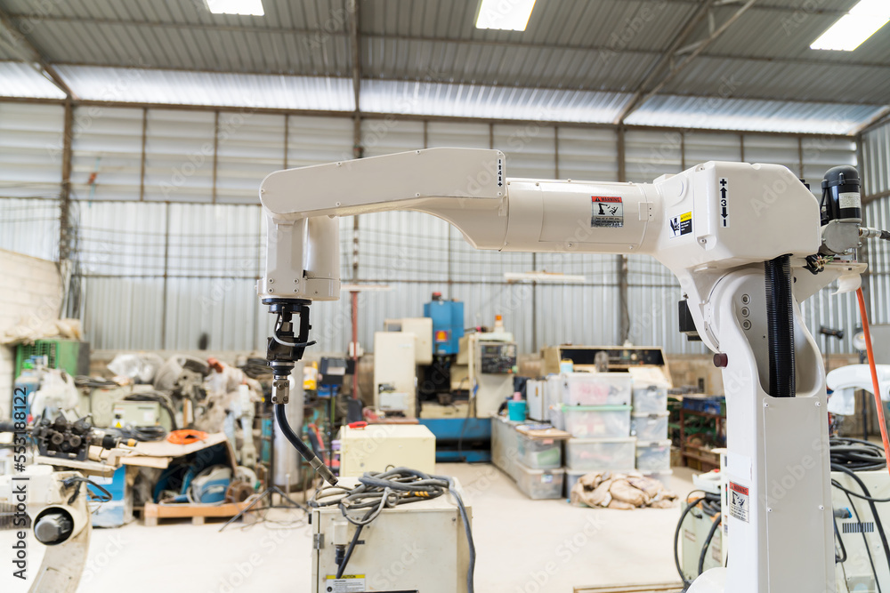 Poster Automatic robot arm system welding machine in the industry factory. Industry robot manufacturing technology