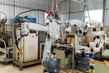 Automatic robot arm system welding machine in the industry factory. Industry robot manufacturing technology