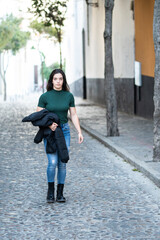 Young woman visiting the streets of Sanlucar de Barrameda