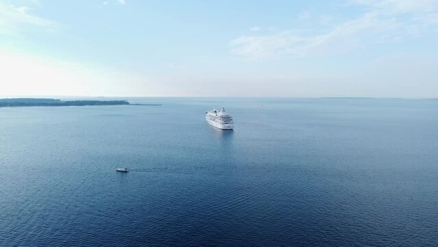 Aerial Seascape with Cruise Ship and Small Boat Sailing, Sunny Day.