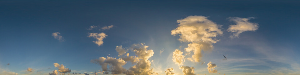 Dramatic sunset sky panorama with Cumulus clouds. Seamless hdr 360 pano in spherical equirectangular format. Complete zenith for 3D visualization, game and sky replacement for aerial drone panoramas